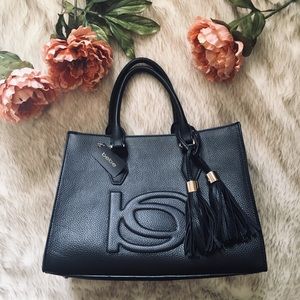 BRAND NEW Bebe black tassel handbag